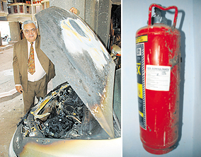 HELPLESS: A man shows his burnt car at the Army flats; and (right) the outdated fire safety equipment installed at the Army flats at Sector 20 in Panchkula. Tribune photos: Nitin Mittal