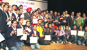 GROUP OF GLORY: Sportspersons strike a pose with their awards at the Tagore Theatre in Chandigarh on Wednesday. 