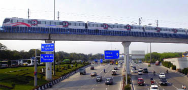 The Delhi Metro Airport Express crossing Dhaula Kuan on its way to Indira Gandhi International Airport in New Delhi on Wednesday.