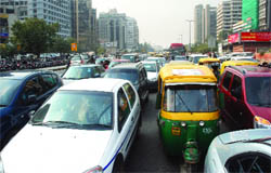 Heavy traffic jam at Barakhamba Road, Connaught Place due to the rally of trade unions from Ramlila Grounds to Jantar Mantar in New Delhi on Wednesday. 