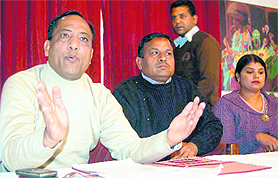 Anil Gupta, member, DRUCC, Northern Railway, addresses a press conference in Dehradun on Wednesday.