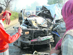 The mangled remains of a maxi cab that met with an accident in Jhajjar on Wednesday.