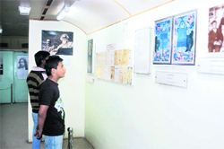 Visitors take a look at the works of the legendary poet Rabindra Nath Tagore displayed in Sanskriti Express in Ludhiana 