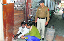 The backdoor entry to Mehfil hotel being sealed by estate officemen at Sector 17 in Chandigarh on Thursday.