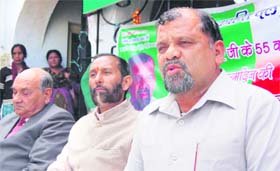 Uttarakhand Kranti Dal President Trivendra Singh Panwar addresses a press conference in Dehradun
