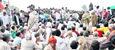 Protesters block the highway near Kheri Sadh village in Rohtak.