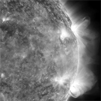 In this image obtained from NASA, a pair of active regions on the Sun put on quite a show over a three-day period, as seen in extreme ultraviolet light from the Solar Dynamic Observatory (SDO) spacecraft. The magnetic field lines above the regions produced fluttering arcs waving above them as well as a couple of flares. Another pair of smaller active regions emerges and trails behind the larger ones.