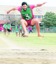 A candidate participates in the long jump at the recruitment drive conducted by the Punjab Police in Amritsar on Friday. 
