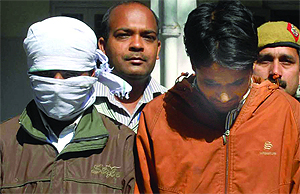 The police held Sarafraz and Mohommad Afroz who were wanted in several robbery cases in Delhi. 
