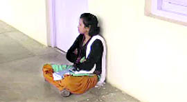 Ranjana Devi, former Pithoragarh Zila Panchayat Chairperson, sits in dharna in Dehradun on Friday. 