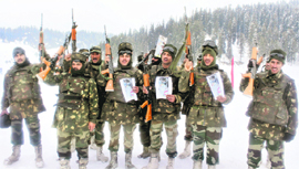 Upbeat Army jawans carry pictures of Indian cricketers at a forward post in the Gulmarg sector near LoC