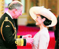 Prince Charles knights Catherine Zeta-Jones