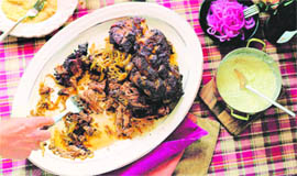 A slow-roasted pork shoulder dish by chef Michael Schwartz is seen in this undated publicity photo.