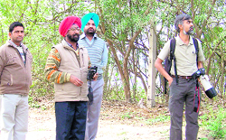 Naturalist Kartik (right) with Ropar birdwatcher Jaspreet Singh (in red turban) during a visit to Ropar. 