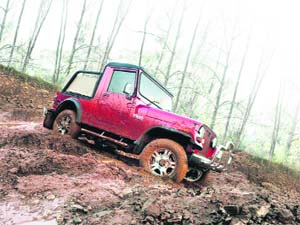 The Thar comes as an open vehicle. A soft top is available as an option