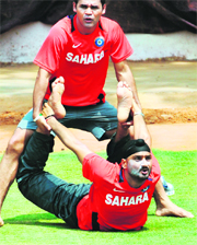 Harbhajan Singh performs yoga in Bangalore on Friday. India play England on Sunday.