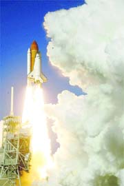 Space shuttle Discovery lifts off from Kennedy Space Centre in Cape Canaveral on Thursday