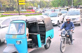 SNARL-UP: Vehicles move at a snails pace at Matka Chowk following the Rose Festival at Leisure Valley