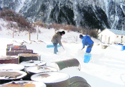ITBP jawans remove snow from the Gunji camp in Pithoragarh district.