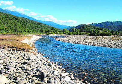 Serene flows the Noa Dihing river inside  Namdapha Game Sanctuary, a tributary of the mighty Brahmaputra 
