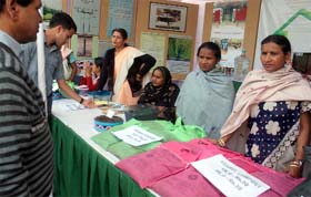 Women at a stall at Mughal Gardens in New Delhi