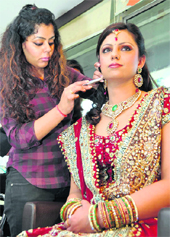 A participant at a bridal makeup workshop in Dehradun on Sunday. 