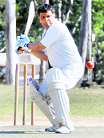 A batsman plays a shot in the Dehradun District Cricket League in Dehradun on Sunday.