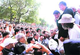 Ajay Singh Chautala reads out a memorandum of demands to party activists at the mini-secretariat in Sonepat