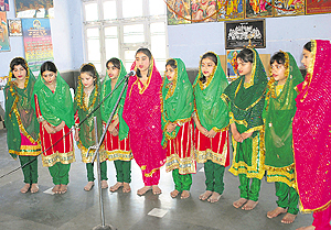 Students give a performance during a function organised by French Club of Jammu and Kashmir at Bal Niketan, Ambphalla, in Jammu on Sunday. A Tribune photograph
