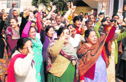 Employees hold a protest against a senior official at Hafed office in Sector 5, Panchkula,