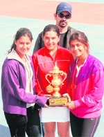 Simply the best: Delhi players after receving the overall tennis trophy during the North East Zone Inter-University Lawn Tennis Tournament at PU in Chandigarh