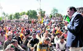 Class IV employees protest in Dehradun on Monday.