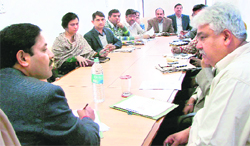 PC Meena, Gurgaon DC, addresses a meeting of civil and police officials of the district.