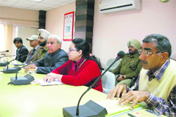 Haryana Lokayukta Justice Pritam Pal addresses district officials at  the mini-secretariat in Kaithal. 