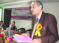 Palwal deputy commissioner Ramesh Verma addresses participants at a seminar in Guru Nanak Khalsa College in Yamunanagar.