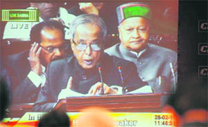 A TV screen in Mumbai shows the Finance Minister presenting the Budget.