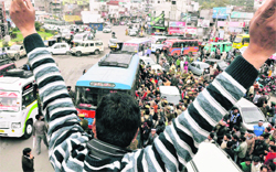 Members of the JK Technocrats Association hold a demonstration in Jammu on Monday. 