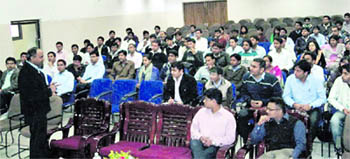 Students of the ICFAI University at a placement meet in Dehradun on Tuesday.
