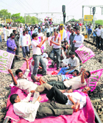 Pro-Telangana activists stop a train at Moulali railway station in Secundarabad.