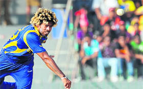 Sri Lankas Lasith Malinga in action against Kenya at the R. Premadasa Stadium in Colombo on Tuesday. Malinga picked up a hat-trick to set up a huge 9-wicket victory for Sri Lanka.