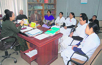 Dr Asha Mathur, Director-General, Health and Family Welfare, in conversation with nurses in Dehradun on Wednesday.