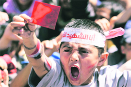 Showdown in yemen A child shouts slogans during a demonstration demanding the resignation of Yemeni President Ali Abdullah Saleh, in Sanaa, Yemen