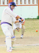 A batsman in action in a match of the 60th District Cricket League in Dehradun on Thursday.