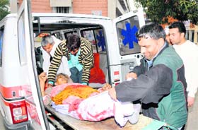 One of the accident victims being shifted to the trauma centre in Karnal