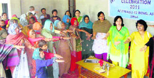 Members of AFWWA administer oath against female foeticide to women of Meerpur village in Sirsa.