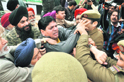Members of the SOS International clash with the police in Jammu 