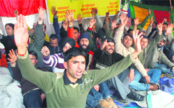 Members of the Jammu and Kashmir Agriculture Technocrats Association stage a protest in Jammu 