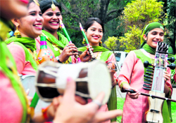 Girls of BBK DAV College, Amritsar, all set with their instruments to perform at the Government College for Women in Ludhiana on Thursday