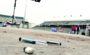 Empty syringes lying scattered at the Guru Nanak Stadium in Ludhiana.