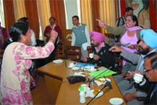 A SAD worker Lakhwinder Kaur (left) and councillor Rajinder Kaur Brar argue on a point during the Zero Hour of the budget meeting of the Municipal Corporation, Bathinda, on Friday.